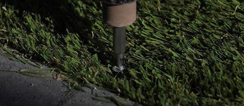 put-green-synthetic-lawn-carpet-screwdriver-screw